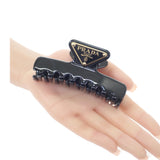 プラダ PRADA メタルクロウクリップ 1IF103_K9D_F0002 ヘアアクセサリー メタル ブラック ゴールド ゴールド金具 レディース【中古】【ABランク】