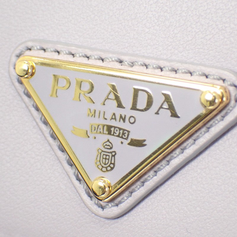 プラダ PRADA シティカーフ タブ財布 1MH043_2CNP_F0230 三つ折り財布 カーフ パープル グリーチネ ゴールド金具 レディース【中古】【Aランク】