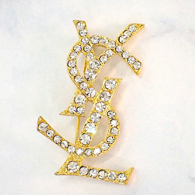 イヴ・サンローラン YVES SAINT LAURENT カサンドラ ブローチ メタル クリスタル レディース【中古】【ABランク】