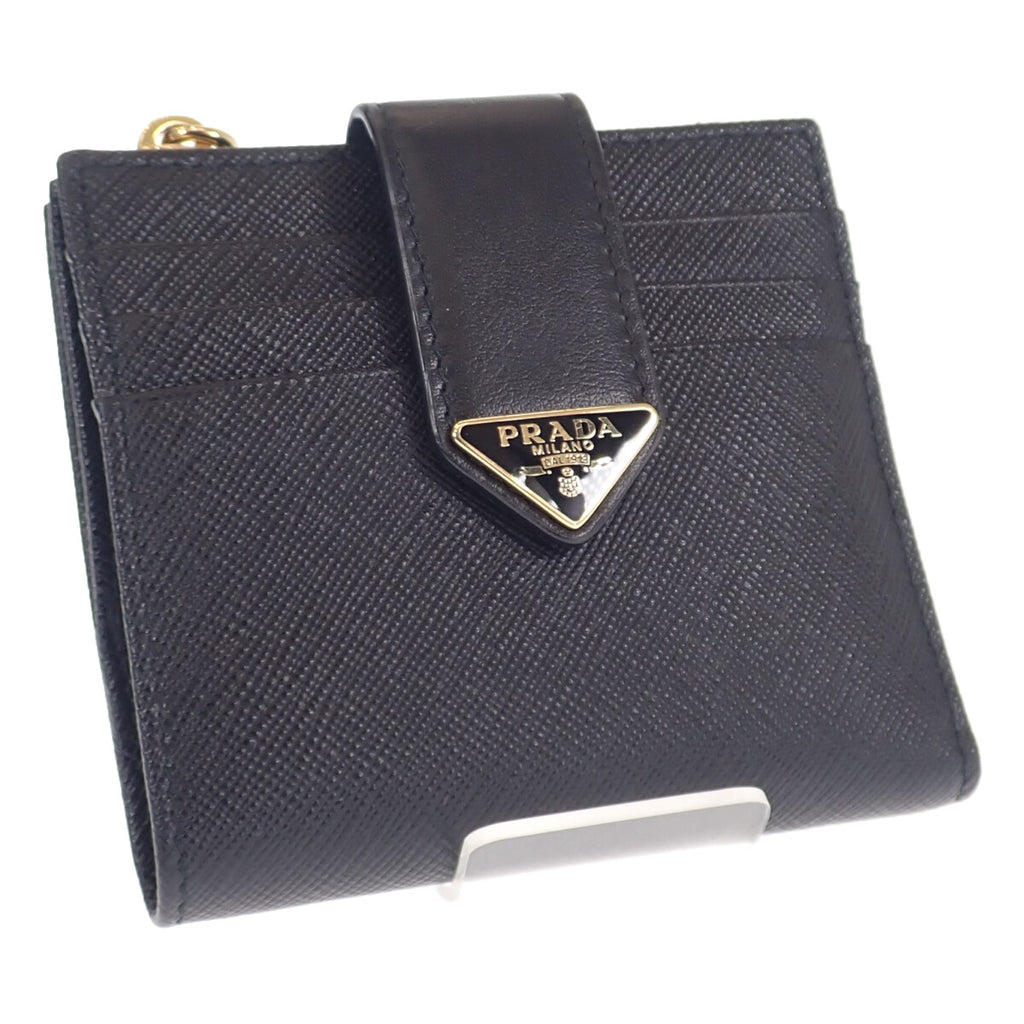 素材【✨美品✨】プラダ　二つ折り財布　サフィアーノレザー　ゴールドロゴ　ネイビー