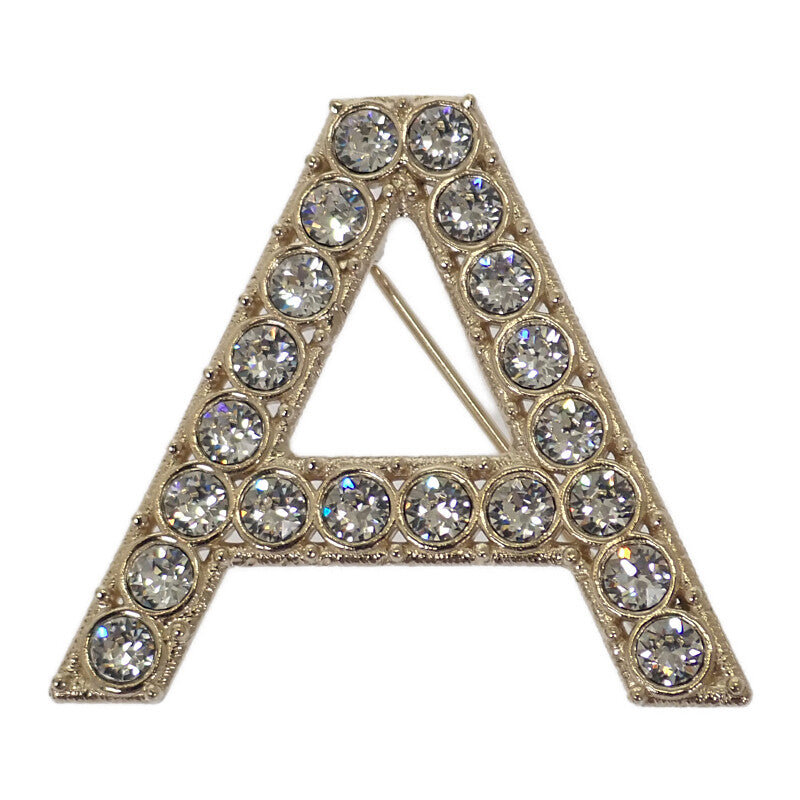 シャネル CHANEL ロゴ クリスタル AB1368 ブローチ メタル ゴールド