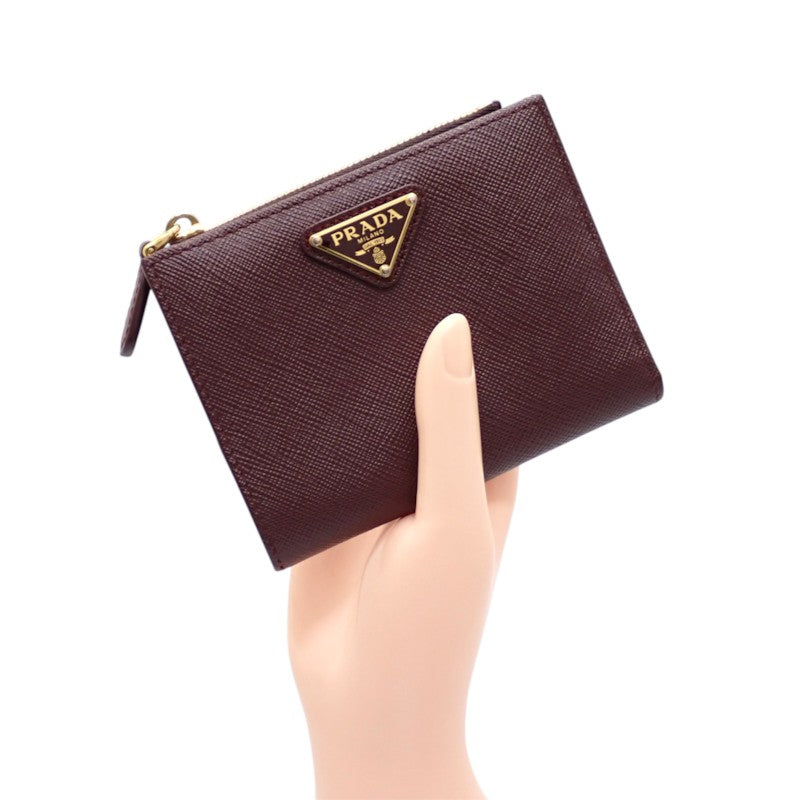 プラダ PRADA トライアングル 1ML050_QHH_F0007 二つ折り財布 サフィアーノ ボルドー バーガンディ ゴールド金具 レディース【中古】【ABランク】